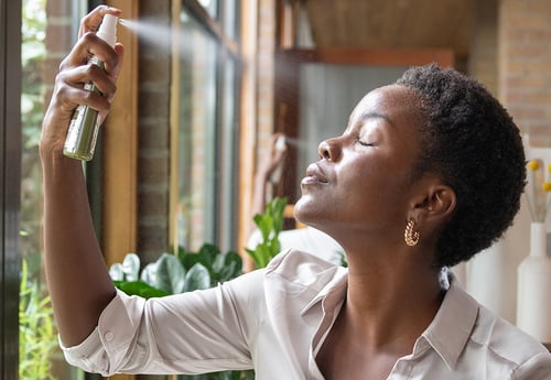 Woman misting face 2